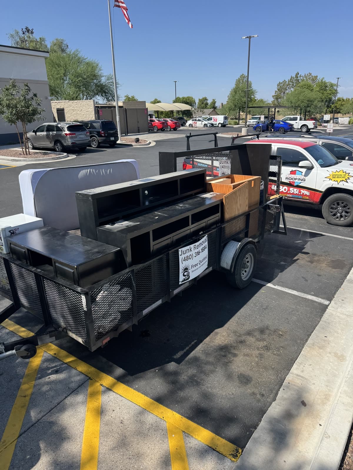 Built-in outdoor grill island loaded on the Sonoran Standard trailer in a parking lot